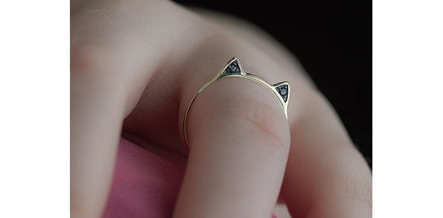 RCH714/06-10 Cat Ear Dia Ring 10ky blk dia 0.06tcw